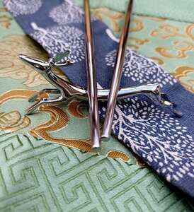 Odkládací jelen z ušlechtilé oceli na hůlky 